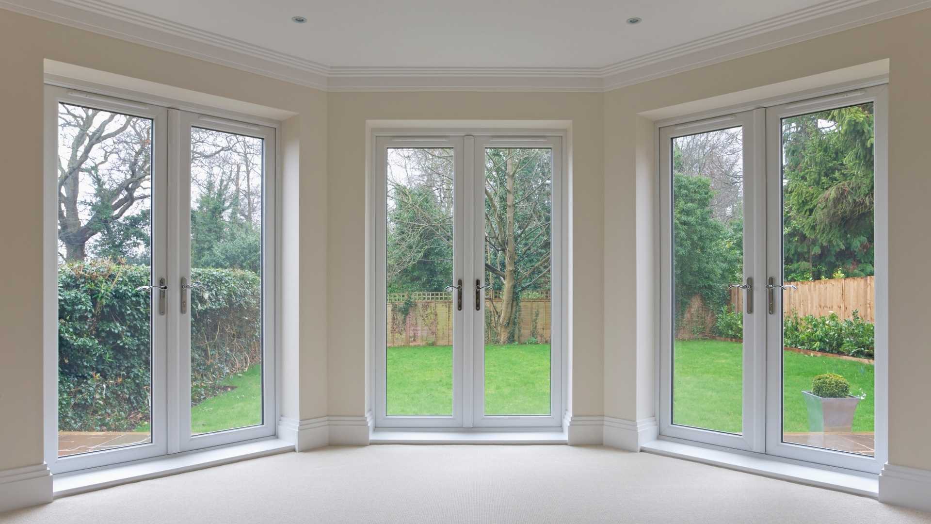 White uPVC French doors — uPVC door lock repairs by Solent Locksmiths, Southampton